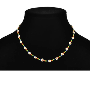 Bohemian colorful rainbow seed bead necklace with white daisies on black velvet bust