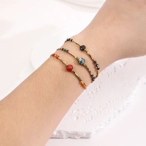 Driedelige set handgemaakte boho edelsteen armbanden met agaat en toermalijn kralen