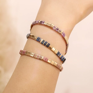 Boho vintage Tila bead bracelets with gold square accents and colorful natural stones