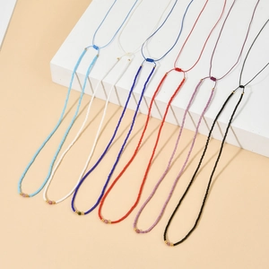 Handmade colorful seed bead necklaces with adjustable cords in six vibrant colors