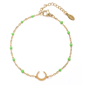 Detail showing gold stainless steel chain with green beads and polished moon pendant
