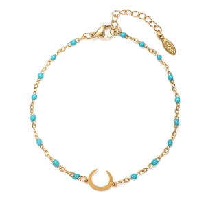 Detail of gold stainless steel moon bracelet with light blue beads and lobster clasp