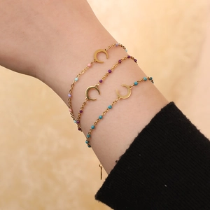 Three-piece stainless steel crescent moon bracelets with colorful enamel beads and gold finish