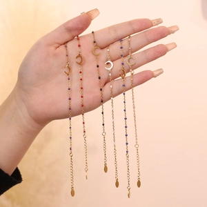 Set of six gold stainless steel moon charm bracelets with colorful drip oil beads