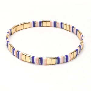 Macro detail of Bohemian Tila bead bracelet featuring colorful rectangular glass tiles