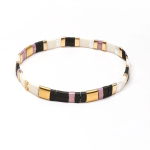 Bohemian Tila bead stretch bracelet with black, white, gold, and lavender tiles