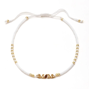 Bracelet MOM en perles japonaises avec breloque football dorée et cordon blanc