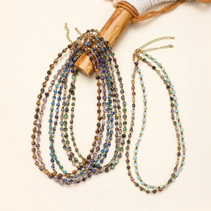 Minimalist Bohemian necklace featuring square natural stone beads and gold metal accents