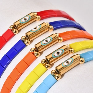 Bohemian elastic beaded bracelet set with colorful tiles and evil eye gold charms