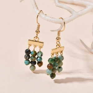 Bohemian dangle earrings with natural stones and gold hooks for beach vacations