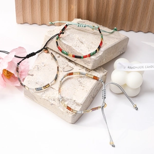 Three-piece set of handmade Tila bead bracelets with colorful woven cords for women
