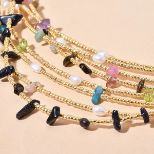 Minimalist layered necklace with gold seed beads, colorful natural stones and pearls