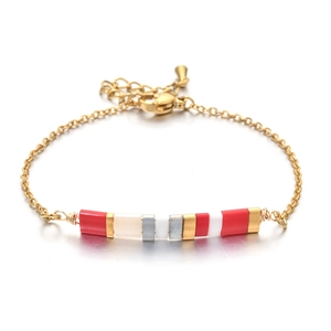 Elegant gold-plated stainless steel bracelet featuring colorful Tila beads with lobster clasp