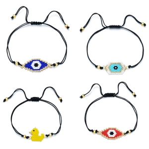 Set of 4 handmade woven seed bead bracelets with evil eye and duck pendants on black cords