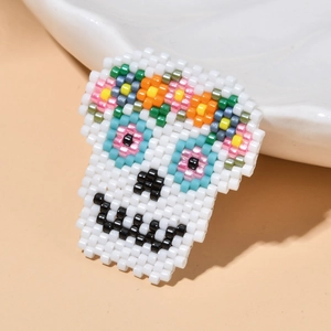 Handmade MIYUKI seed bead sugar skull brooch with colorful floral patterns for DIY jewelry