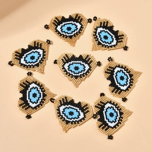 Handmade Bohemian MIYUKI bead heart charms with Turkish Evil Eye design for jewelry