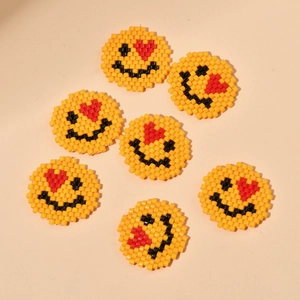 Lot de 7 breloques smiley en perles MIYUKI jaunes faites main avec détail œil de cœur
