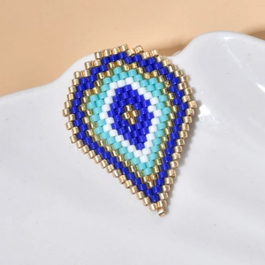 Handmade MIYUKI seed bead Evil Eye teardrop pendant with blue and gold geometric patterns