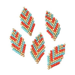 Handmade MIYUKI leaf pendants in red and cyan colors with gold seed beads for DIY jewelry