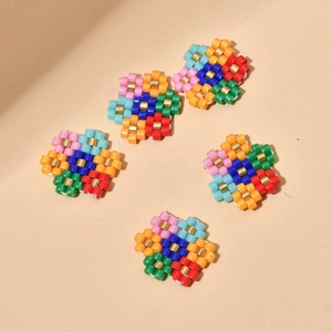 Handmade MIYUKI seed bead flower charms in vibrant colors for DIY jewelry making
