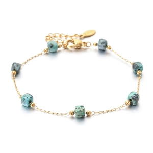 Gold plated stainless steel thin chain bracelet with turquoise stone cubes and lobster clasp