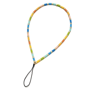 Colorful cylindrical bead phone charm with gold metal spacers and black loop strap