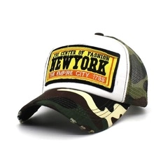 Detail of New York patch and vintage camouflage embroidery on the cotton baseball cap