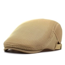 Close-up of khaki breathable mesh baseball cap with adjustable strap and cooling fabric