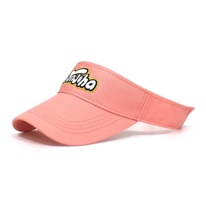 Detail of pink cotton sun visor with 3D letter embroidery and reinforced stitching