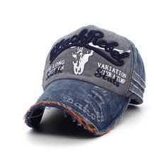 Close-up of distressed brim and Black Rebel 3D embroidery on the gray patchwork cap
