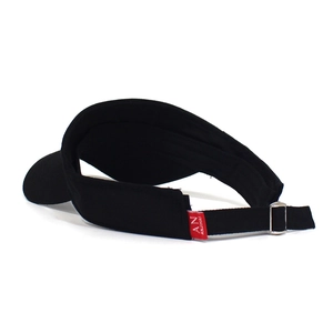 Detail of adjustable back strap on black sun visor with silver metal buckle and woven label