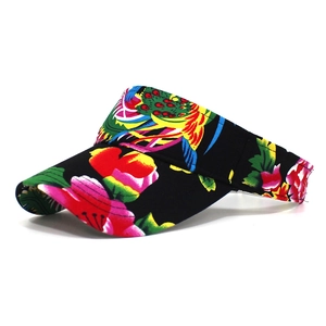 Detail view of the vibrant floral embroidery and sturdy sun visor brim for women