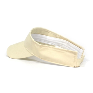 Detail of beige cotton sun visor with reinforced brim stitching and adjustable velcro strap