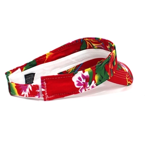 Detail view of red floral sun visor featuring 100% cotton material and inner sweatband