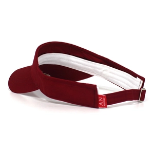 Detail view of the inner white sweatband and adjustable strap on a burgundy sun visor cap