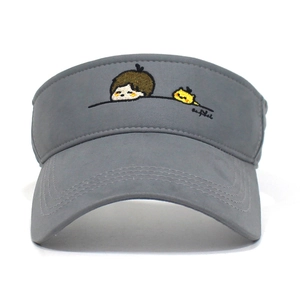 Detailed close-up of cartoon boy and yellow bird embroidery on gray cotton sun visor