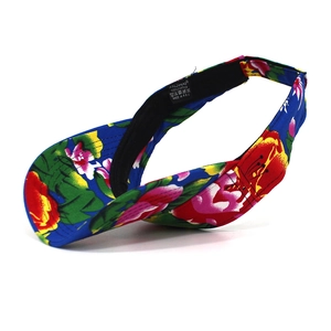 Detail view of cotton floral visor showing high-quality fabric and internal tag
