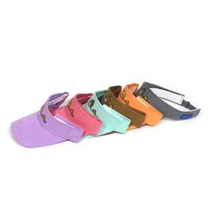 Detail of adjustable cotton sun visors with cartoon embroidery in six assorted candy colors