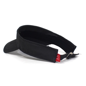 Detail of adjustable metal buckle and strap on black cotton sun visor hat back view