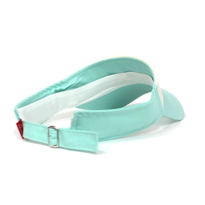 Detail view of the mint green sun hat featuring an adjustable metal buckle and strap