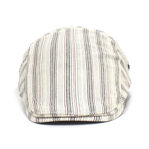 Detail of striped cotton flat cap showing vertical red, green and beige patterns