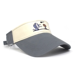 Detailed close-up of cute embroidery and grey brim on a cotton sun visor hat