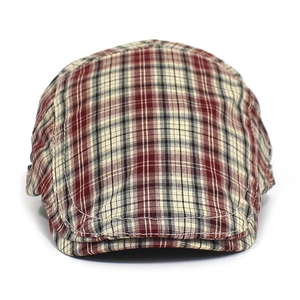 Detailed view of vintage plaid pattern and stitching on a classic flat cap for men