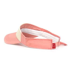 Detail of adjustable metal buckle and pink-beige patchwork sun hat with sweatband