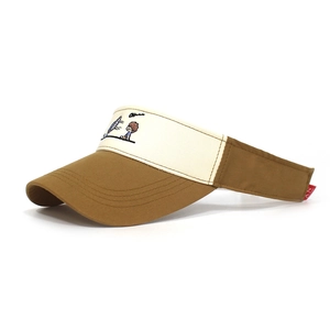 Detailed close-up of a cotton sun visor with cartoon embroidery and reinforced stitching