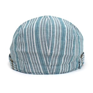 Detail of adjustable metal buckle and striped texture on a cotton flat cap