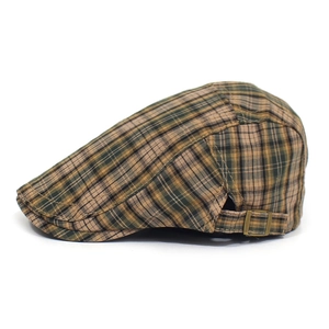 Detail shot of the adjustable metal buckle and vintage plaid texture on the flat cap