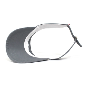 Detailed view of the adjustable metal buckle and stitching on the gray sun visor hat