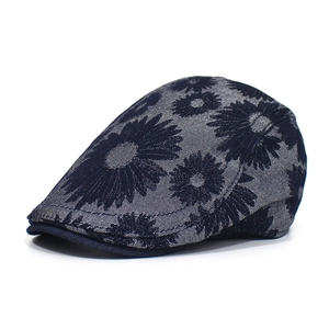 Detailed close-up of navy blue floral print on high-quality cotton fabric ivy cap