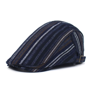Adjustable striped cotton newsboy cap in navy and brown with a metal side buckle